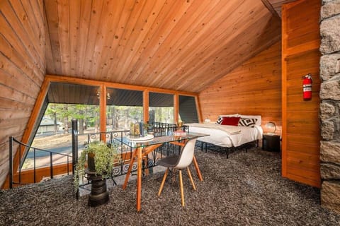 Workspace and sleeping loft.