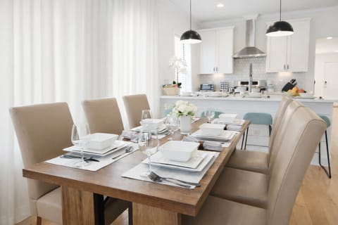 
The inviting dining area is seamlessly connected to the kitchen