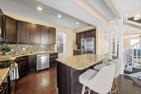 Enjoy the convenience of a connected kitchen and dining area, designed for comfort and conversation.