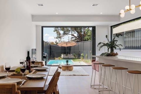 The home features a beautifully designed open-living, dining and kitchen area. With bifold doors, you can experience indoor, outdoor living at its best!