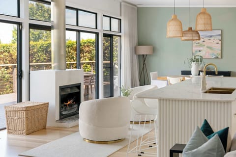 Elegant relaxing zones, surrounded by natural light and calming coastal tones. *Please note: fireplace not in use between Dec 1 - April 1