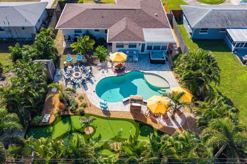 Backyard goals, unlocked! From pool splashes to fire pit hangs and a little putt-putt competition in between—this backyard was made for unforgettable vacations.