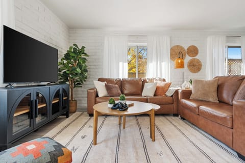 Inviting living room, with additional space for 2 with a queen sofa bed.