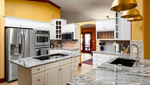 Cook in Style – This kitchen features high-end appliances, ample storage, and everything you need for a seamless culinary experience.