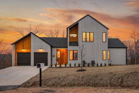 Grand executive home with spacious driveway and contemporary design—perfect for luxury group getaways.