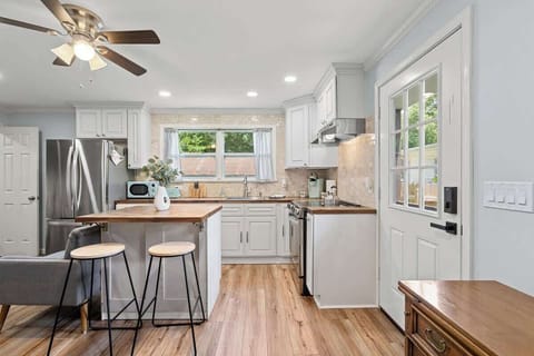 Cook with ease in this functional kitchen complete with bar-top seating. It’s the ideal spot for morning coffee or casual dining.