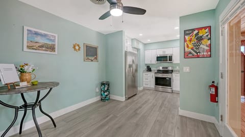 The kitchen welcomes you with airy, open space and modern finishes.