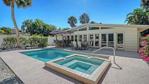 You'll slip right into vacation mode as you relax beside the sparkling pool.