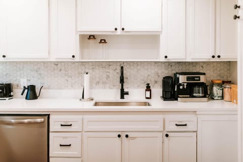 A fresh, welcoming kitchen setup perfect for brewing, cooking, and relaxing.