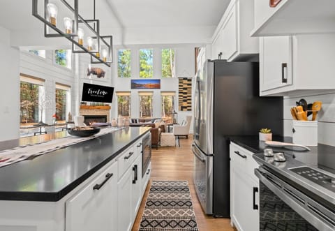 Designed with both style and function in mind, the kitchen makes cooking and entertaining feel effortless.