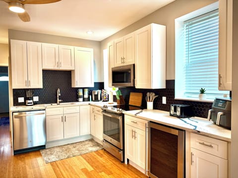 All major appliances including Kuerig, Airfryer, baking items, and a wine fridge