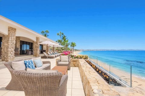 Oceanfront deck living — where breezes meet breathtaking blue horizons.
