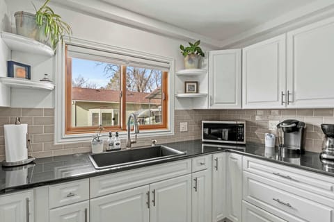 Fully equipped kitchen with natural light.