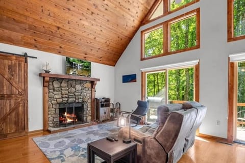 Cozy living room with wood burning fireplace