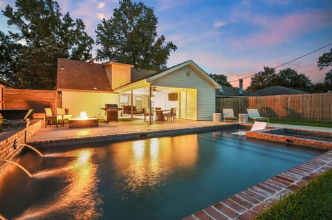 BBQ poolside with your loved ones outside while watching the big game or your favorite movie!