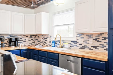 Cook, gather, and enjoy in this modern, spacious kitchen