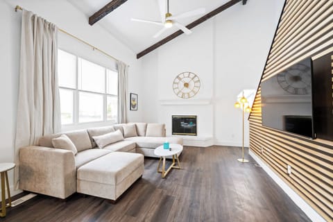 Unwind & stream your favorites on the smart TV in the cozy living room 