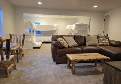 Finished basement bunk(4) room three trundles, Ruko TV, games, tables.