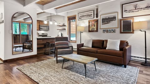 Cozy Mountain Living: Relax in this stylish, sunlit alpine living room.