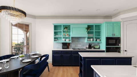 Marble countertops, custom cabinetry, and a kitchen worth showing off.