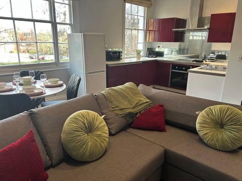 Bright living room, with open plan kitchen and dinning