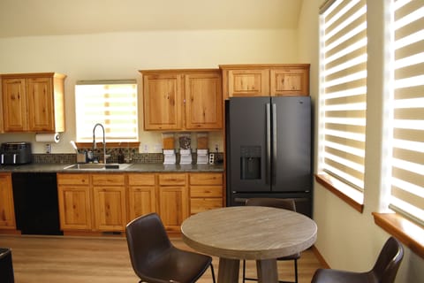 2nd floor – Full kitchen – breakfast bar seating for 4.