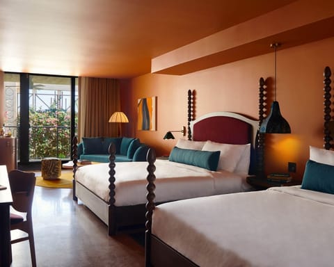 Wake up to sunlit comfort and step onto your balcony.