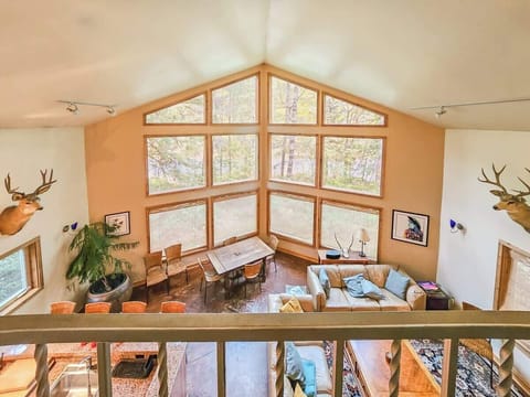 2nd floor view of the floor to ceiling great room windows.