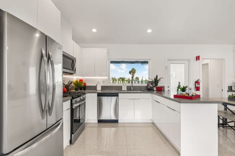 Bright kitchen w/ ample counter space & modern appliances, ready for easy meals