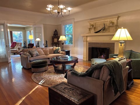 Living Room with Cozy seating, fireplace and large screen tv 