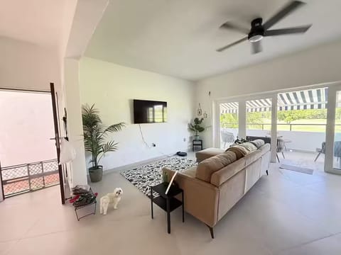 The main door of the Villa in open living room space to connect the terrace. 