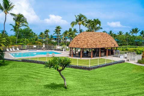 View of the community pool and longhouse available for guest use.  Hot tub and mens/womens bathrooms.  Outdoor shower.