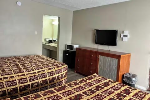 Kick back with in-room TV, microwave, and easy snacks.