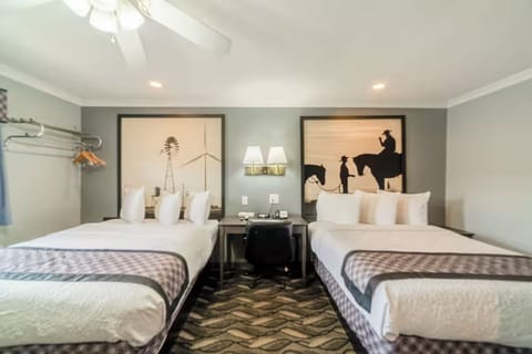 Share the space easily with matching beds and relaxing artwork.