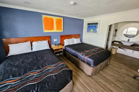 Unwind in a spacious double‑bed room with crisp linens.