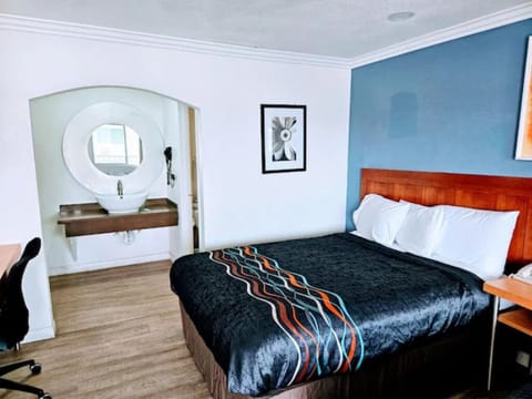 Relax after adventures in a comfy room with handy vanity.