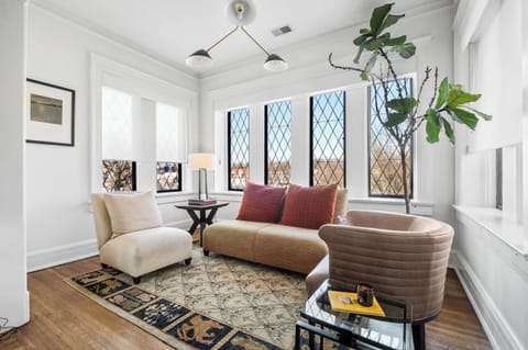 Living Room: Designed for longer stays—this bright, modern living room offers a comfortable place to work, relax, and truly settle in.