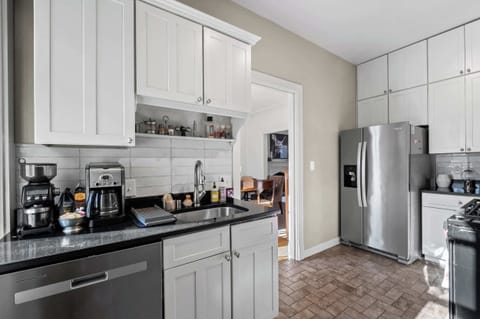 Kitchen: Whether you’re staying a few weeks or longer, this functional kitchen offers the space and tools you need to cook comfortably and consistently.