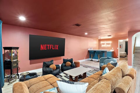 Step into ultimate comfort with plush seating, immersive sound, and a big screen experience that makes every movie night unforgettable. From family marathons to solo binge sessions, this home theater turns ordinary nights into VIP events.