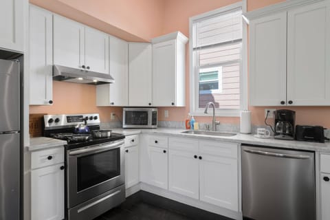 Kitchen- stainless steel appliances, coffee maker, coffee, creamer, sugar