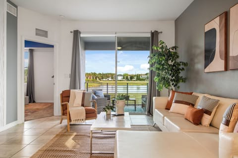 Spacious living room with natural light and a welcoming atmosphere.