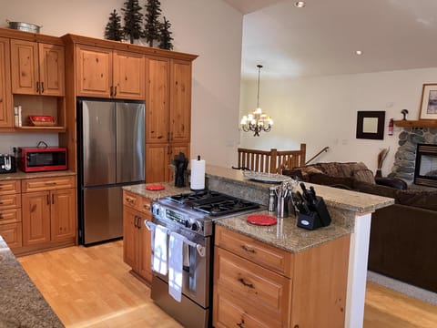 Kitchen stove and fridge.
