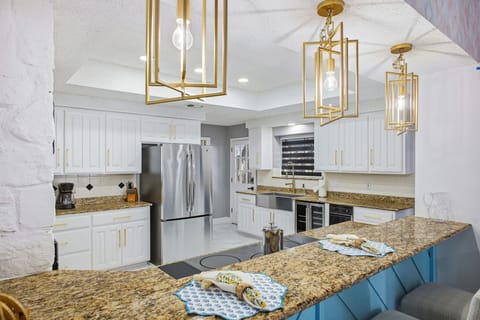 Whip up breakfast, cook dinner, or just sip coffee while enjoying a spacious, stylish kitchen designed for culinary creativity and laughter-filled moments.