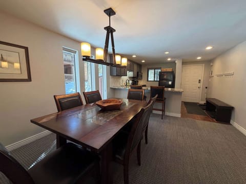 Dining table with 6, plus 2 at bar