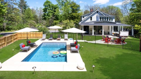 Grab a cold drink from the outdoor fridge, claim your lounger, and let the afternoon disappear. Four feet deep, perfect for floating. Open late April through mid-November.