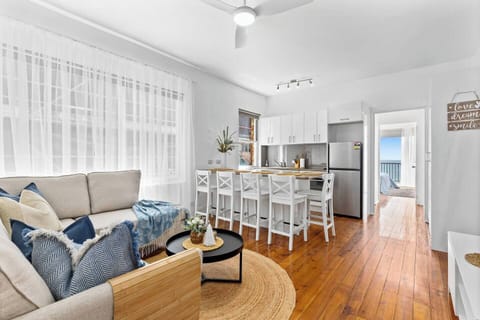 Open living, dining, and kitchen area