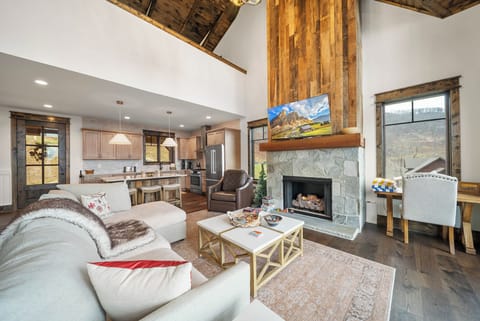 Stacked-Stone Gas Fireplace and TV in the Living Room