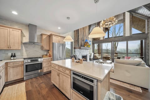 Spacious Kitchen with a View from the Wall of Windows