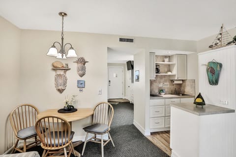 The dining area has seating for three people.