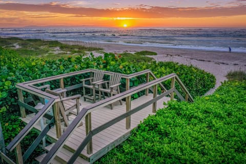 Take a quick stroll over the boardwalk to the beach from the property, or relax and watch the sun rise.